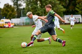 Kevin Lebersorger 27, VfL Wolfsburg U19 in duel with Adem Imeri 17, SpVgg  Greuther Fürth