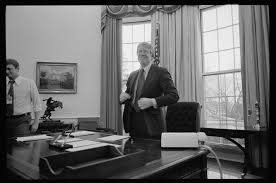 President Jimmy Carter Standing Behind His Desk In The Oval Office Of The White House Washington D C Jimmy Carter Oval Office Presidential History