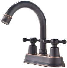 It is a type of a sensor widespread waterfall bathroom deck mounted faucet. Ufaucet Modern Oil Rubbed Bronze 2 Handle Centerset Stainless Steel Bathroom Faucet Oil Rubbed Bronze Bathroom Sink Faucet Amazon Com