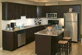 Kitchen island designs are driven largely by cabinet depth. 5 Steps To Creating A Kitchen Island Using Stock Cabinets