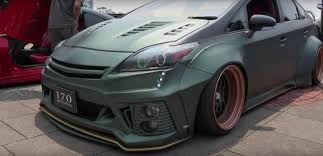 The prius may have been the subject of ridicule for many years, but people have started to respect this hybrid hatchback in america. Toyota Prius With Rocket Bunny Kit From 170 Motoring Is An Insane Jdm Custom Hybrid Autoevolution