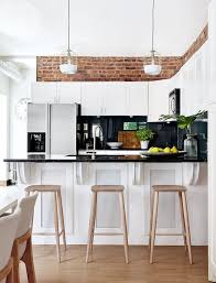 Modern Kitchen Design Idea With White Cabinets Black Tabletop And Modern W Decorating Above Kitchen Cabinets Above Kitchen Cabinets Minimalist Kitchen Design