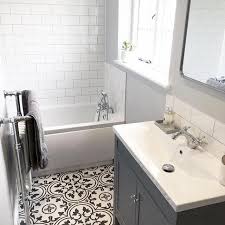 Black And White Patterned Floor Tiles White Metro Wall Tiles Photo By Poms Abode Whitetiledba Patterned Floor Tiles Patterned Bathroom Tiles Black Bathroom