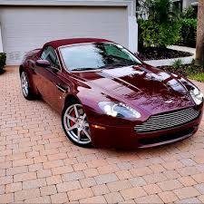 Image result for Amethyst Red 2011 Aston Martin