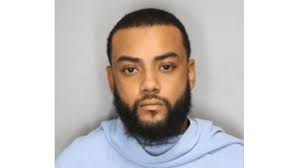 Champaign man faces eight child pornography charges after police raid