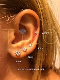 I am quite sure that she will be delighted with them. Amazon Com 14k White Gold Solitaire Round Cubic Zirconia Cz Stud Earrings In Secure Screw Backs 2 5mm Clothing