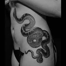 Black And Grey Snake On Torso Tattoo By Nate Fierro Tattoos Snake Tattoo Traditional Snake Tattoo