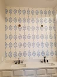 An accent wall will push a certain point in the room forward since it is visually different from the rest of the wall, be it in colors, patterns, or sticking wallpapers. Bright Cheery Accent Wall In New Home Bathroom The Wallpaper Lady S Blog