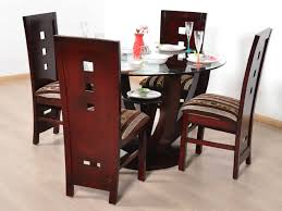 Sheesham wood dining table and chairs:a durable and sturdy sheesham wood dining chairs and tables are a great choice for those who love hardwood at urban ladder, you can buy dining tables and chairs such as solid wood dining sets with the assurance of great quality at great prices! Douglas Teak 4 Seater Dining Table Set Buy And Sell Used Furniture And Appliances Online
