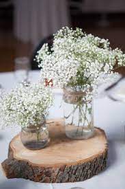 Rustic Mason Jar Baby S Breath And Wood Centerpieces Wedding Centerpieces Mason Jars Wood Centerpieces Wood Centerpieces Wedding