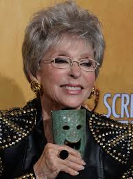 Rita moreno is one of the very few performers to win an oscar, an emmy, a tony and a grammy, thus becoming an egot. Rita Moreno S Crowded Trophy Shelf Just Got One More