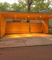 Impresive Design Carport Area With Wooden Design Material With Warm Lighting Carport What To Consider When Choosi In 2021 Modern Carport Carport Designs Carport Garage