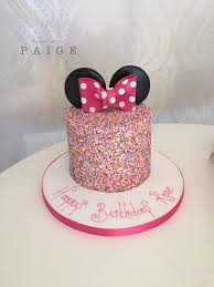 Girly 2nd Birthday Cake Designs For 2 Year Old Boy Minnie Mouse Themed Sprinkle Covered Birthday Cake Minnie Mouse Birthday Cakes Minnie Mouse 1st Birthday 2nd Birthday Party For Girl
