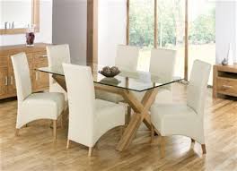 A Buyer S Guide To The Dining Table Modern Glass Dining Table Glass Dining Room Table Glass Top Dining Table
