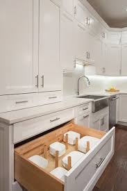 A Kitchen With Classic Custom White Shaker Cabinets Wine Cooler Microwave A 48 Inch Kitchen Island Storage Kitchen Island With Sink Kitchen Cabinet Storage