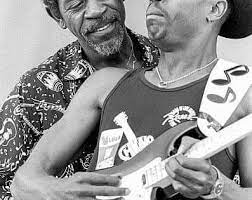21 Bernard Allison Fore Plays Guitar With His Father Fellow Bluesman Luther Allison At The 7th Annual Chic Chicago Blues Festival Playing Guitar Grant Park