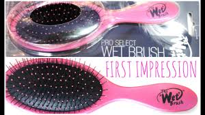 Instead of brushing through hair that's sopping wet, use a microfiber towel to get as much water out as possible first. The Wet Brush First Impression Demo On Wet Dry Hair Youtube