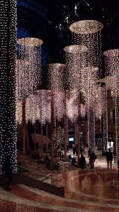Falling Droplet Chandeliers Create An Illusion Of Falling Light Beautiful X Nyc Christmas New York Christmas Christmas Lights