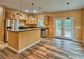 Because of the warm appearance, cream cabinets are always compatible with a warm floor. What Flooring Goes With Hickory Cabinets Hickory Kitchen Cabinets Hickory Cabinets Kitchen Cabinets And Flooring