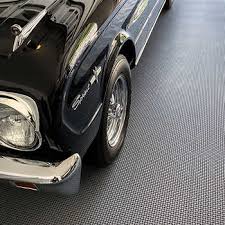 The garage floor tile company's bundle of durable interlocking floor tiles is a cost effective way of flooring an area with ramps. Garage Flooring Costco