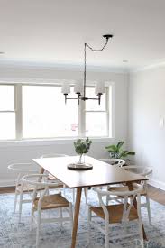 Keep chandeliers or pendant lighting out of your face by installing at least 30 inches over the table. What To Keep In Mind When Buying A Rug The Diy Playbook Interior Design Dining Interior Design Dining Room Dining Room Light Fixtures