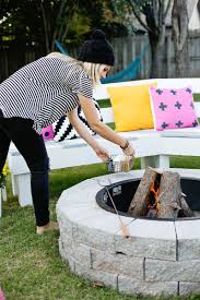 There's a primal caveman satisfaction to sitting around an open for less than $200 and an easy weekend's worth of work you can create a focal point in your yard that is a safe and attractive place to build a fire. Make Your Own Fire Pit In 4 Easy Steps A Beautiful Mess