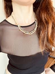 Speckled Rhodonite Gray, Black, and Pink, White Cylinder Beaded Necklace  Antiqued Bronze Dagger Bib with Gold Toggle