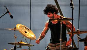 She is known for being a drummer. Pop Evil S Chachi Riot On Michigan Football Onyx And His Beloved Red Wings Amps And Green Screens
