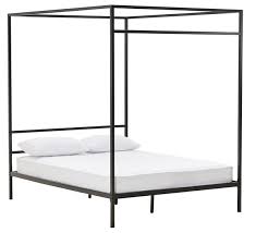 It includes a bed and nightstand, both crafted from a blend of solid and engineered wood in a black finish. Toulon Queen 4 Poster Bed Fantastic Furniture