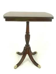 Imperial grand rapids mahogany tea table,imperial grand rapids mahogany tea table, brass cap foot, three leg single pedestal base, 24.5 scroll edge the true grand rapids certified side board and table circa: 1900 1950 Imperial Grand Rapids Vatican