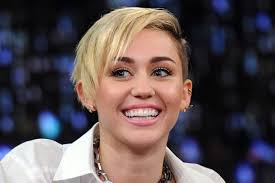 Miley Cyrus Simultaneously Tops Two Uk Charts The Global