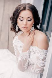 Or she can leave her hair down with an optional center part to open her face and soften harsh angles. Gorgeous Wedding Hairstyles And Makeup Ideas Belle The Magazine