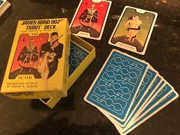 That was a joke based on live and let die movie: Got These As A Gift A Few Years Ago The Official Live And Let Die Tarot Deck As Seen In The Movie Even Has The 007 Logo On The Back Of The