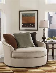 Furniture Interesting Round Swivel Loveseat Chairs For Living Room With Cream Fabric Swivel Chair And Br Round Swivel Chair Living Room Chairs Ashley Furniture