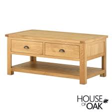 The lower shelf can house rectangular or square storage baskets. Portman 2 Drawer Coffee Table In Oak House Of Oak