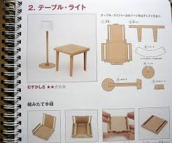 Muji Book Of Fold Up Cardboard Furniture By Feltcafe Via Flickr Cardboard Furniture Diy Cardboard Furniture Cardboard Crafts