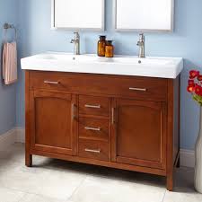 This free standing vanity includes four soft closing doors and four soft closing drawers with brushed nickel hardware that adds a modern appeal. Should I Convert Single Sink To Double Sink Vanity W Only 48 Counter