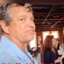 Who is the gentleman in the photo?