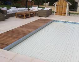 les volets de piscine immerges sheltom permettent une protection et une securisation de la baignade a prix attractif rideau piscine piscine et jardin piscine