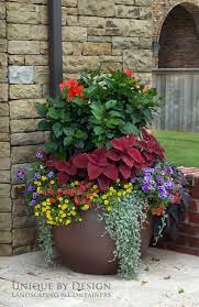 Large outdoor planters are a great way to display plants around the house and its surroundings. How To Have Large Flower Pots Outdoors Container Gardening Flowers Large Flower Pots Container Flowers