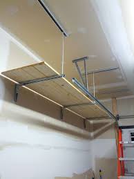 Overhead storage racks are perfect for any home or garage. Garage Shelves From Ceiling The Garage Journal Board Diy Garage Storage Garage Decor Diy Garage