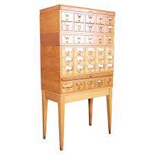 The dimensions are 42 wide x 21 deep x 61 high. Mid Century Modern 35 Drawer Library Card Catalog By Remington Rand At 1stdibs