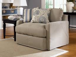 You want a chair and a half recliner that. Greyish Cream One And A Half Chair With Pillows At Home Furniture Store Ashley Furniture Chairs Shabby Chic Table And Chairs