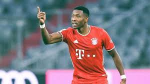 Bayern's david alaba, left, poses with bayern munich ceo karl heinz rummenigge prior to the start of the bundesliga soccer match between bayern munich and fc augsburg at the allianz arena stadium in munich, germany, saturday, may 22, 2021. David Alaba Pindah Ke Real Madrid Dari Bayern Muenchen Dikontrak 5 Tahun Bola Tempo Co