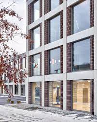 schulerweiterung von boltshauser architekten ornamentale sachlichkeit bei zurich architektur und architekten news meldungen nachrichten ファサード 建物 民宿