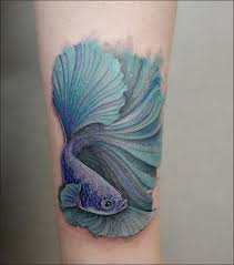 It is rare to find and therefore the tattoo is considered very lucky. 60 Cute And Lovely Fish Tattoos Design Ideas For Men Women