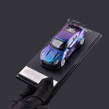 The suspension (length 60 mm), the different wheel rims with the tires, the servo, the receiver, drive shaft and the differential is from tamiya. Time Model 1 64 Nis Gtr R35 Skyline Super Gt Car Chameleon Diecast Toy 1 64 Super Model Car Vehicle With Case Diecasts Toy Vehicles Aliexpress