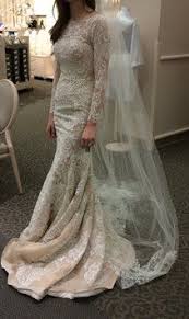 This brand creates cheаp and elegant options for contemporary brides. Oleg Cassini Ivory Champagne Long Sleeve Lace Trumpet Gown Cwg670 Formal Wedding Dress Size 4 S 28 Off Retail Formal Dresses For Weddings Wedding Dresses Unique Luxury Wedding Dress