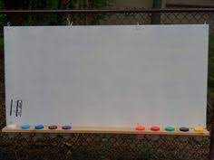 Kids Outdoor Paint Station Easel A Sheet Of Plexiglass Sprayed White On The Back 4x6 Piece Of Cedar School Outdoor Classroom Kids Outdoor Spaces Outdoor Kids