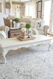 15 Pretty Ways To Style A Coffee Table Ideas Teal Modern Dy Glass Simple Tray Living Room Decor Rustic Farmhouse Style Living Room French Country Rug